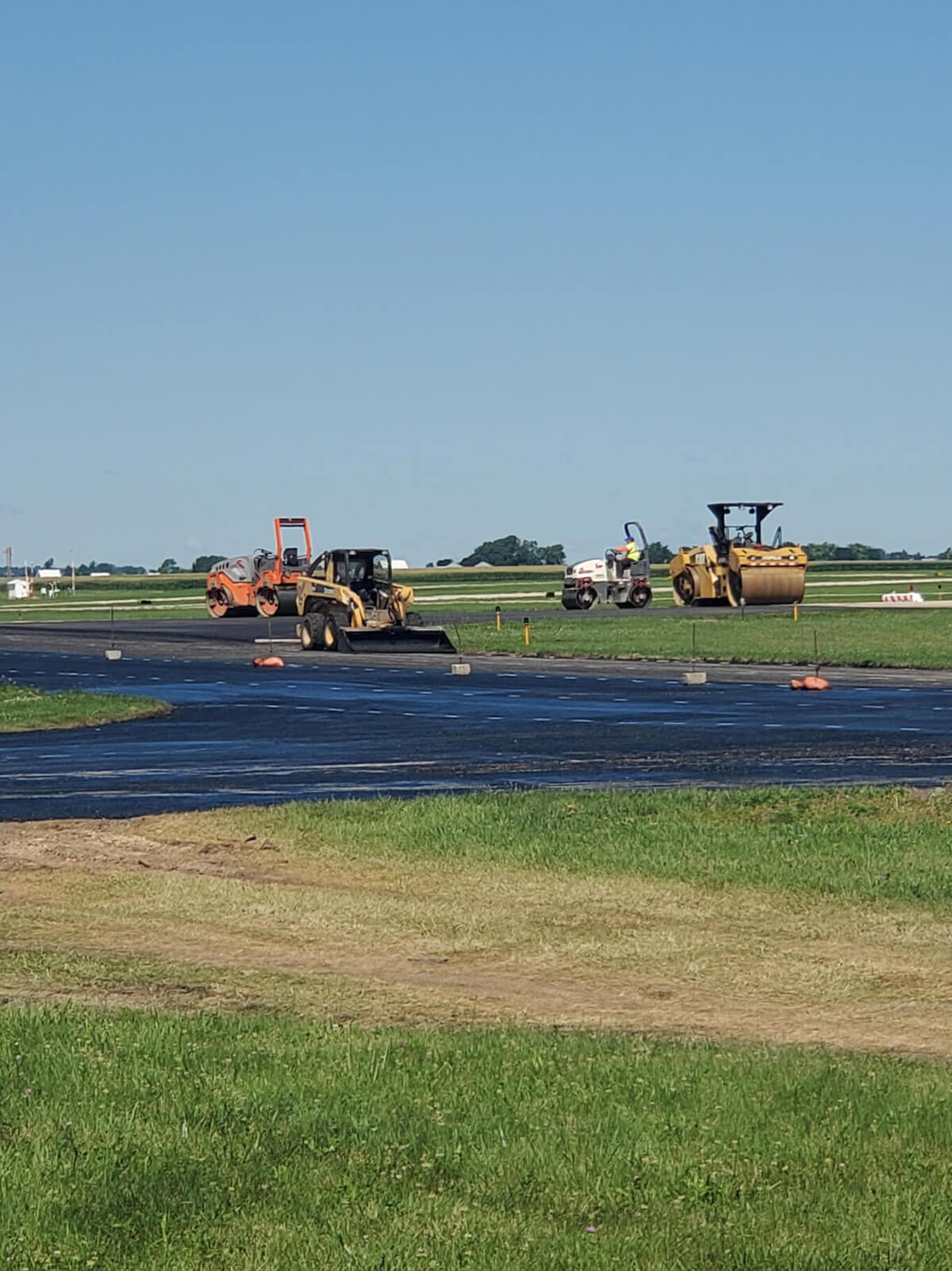 Cold Milling Process with ALAMP Crew Members and Vehicles in the Background